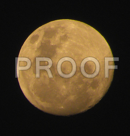Orange moon showing the Man On The Moon